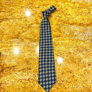 PAUL FREDRICK SILK HAND TAILORED TIE WITH NAVY, YELLOW AND RED. MADE IN THE USA